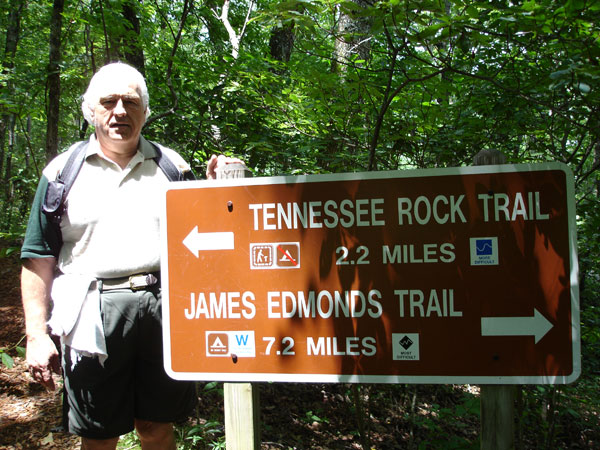 Lee Duquette at the Tennessee Rock Trail sign
